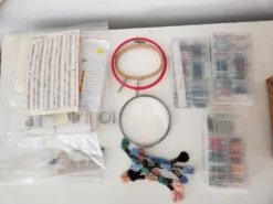 1980s Vintage Wicker Basket With Cross Stich Kit -Chairish Shop 1980s vintage wicker basket with cross stich kit 9966 scaled