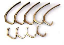 Brass Hooks In The Style Of Carl Auböck, 1950s, Set Of 9 10 Brass Hooks In The Style Of Carl Auböck, 1950s, Set Of 9 -Chairish Shop brass hooks in the style of carl aubock 1950s set of 9 3159